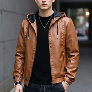 Man wearing a brown leather jacket with a blurred street background