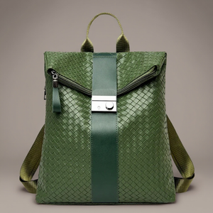 Green woven backpack with a strap on a beige background