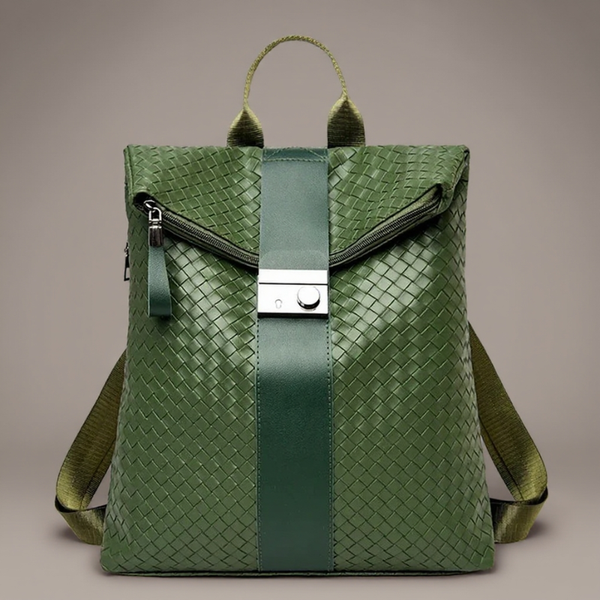 Green woven backpack with a strap on a beige background