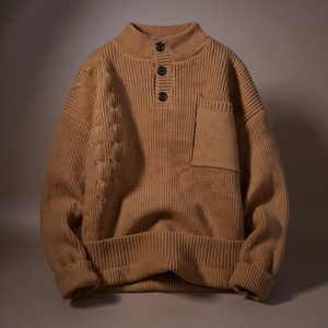 Brown ribbed sweater with button details on a brown background