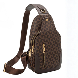 Brown patterned sling bag with gold zippers on a white background