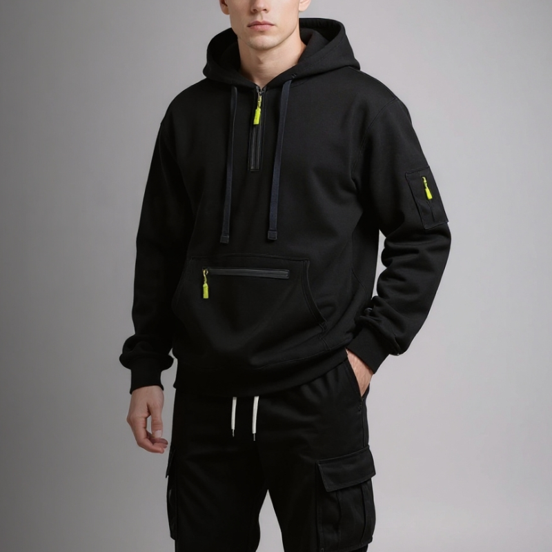 Man wearing a beige tracksuit with cargo pockets on a brown background