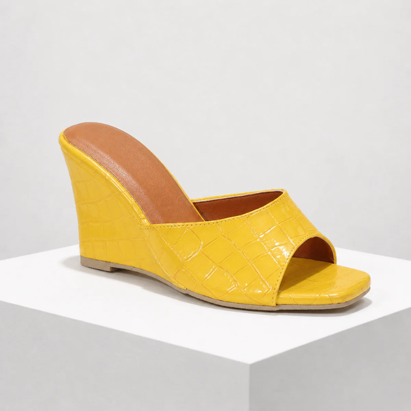 Women's yellow heels close-up — elegant — Christina Wedge Sandals for every occasion — Sonverdano