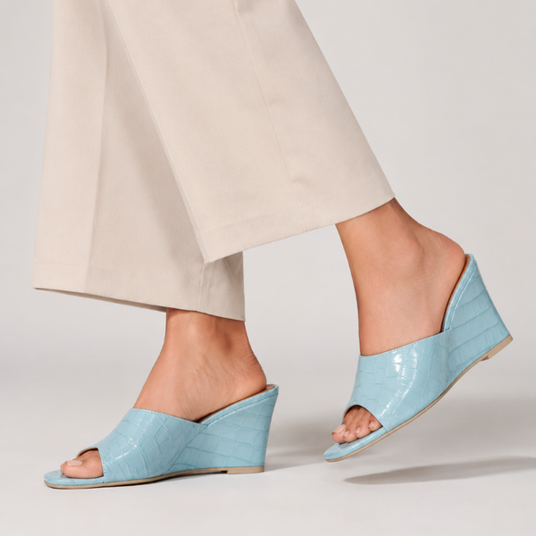 Women's heels close-up — elegant — Christina Wedge Sandals for every occasion — Sonverdano