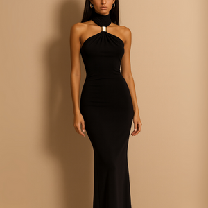 Black halter neck dress on a model against a beige background