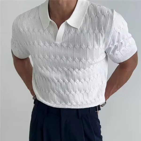 White textured polo shirt worn by a person on a plain background