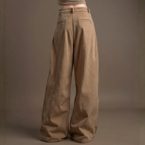 Brown wide-leg pants on a plain background