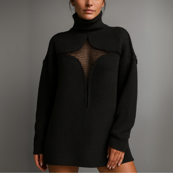 Black knit dress with mesh panel on a gray background