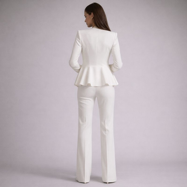 Woman wearing a white suit on a light purple background