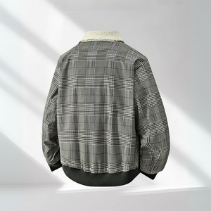 Plaid shirt with a textured collar on a white background