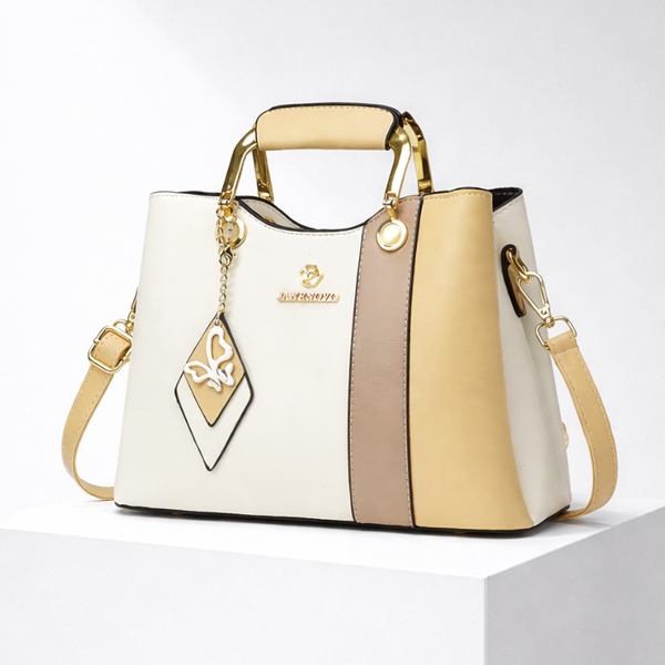 Women's yellow leather handbag close-up — everyday — Janenovo Butterfly Handbag — Sonverdano