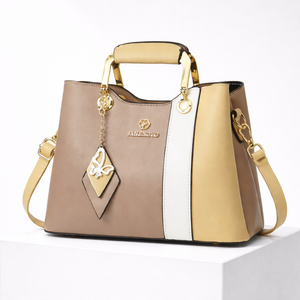 Women's beige leather handbag color detail — everyday — Janenovo Butterfly Handbag — Sonverdano