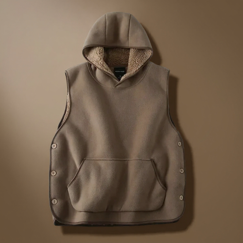 Brown hooded vest with sherpa lining on a brown background
