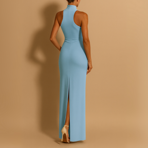 Woman wearing a light blue sleeveless gown with a high slit on a beige background