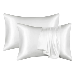Two white satin pillowcases on a white background