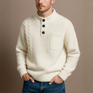 Man wearing a cream knitted sweater with button details against a beige background