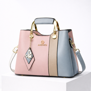 Women's pink leather handbag side view — everyday — Janenovo Butterfly Handbag — Sonverdano