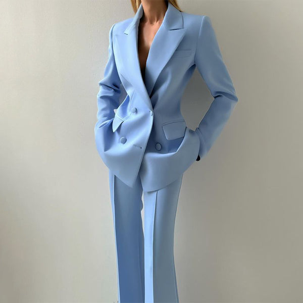 Light blue suit worn by a person against a plain background