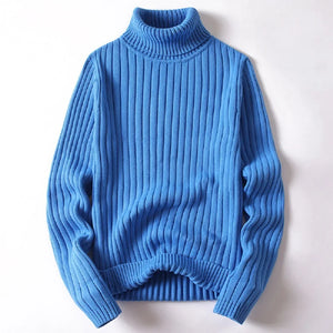 Blue turtleneck sweater on a white background