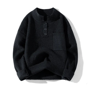 Black knitted sweater with button details on a white background