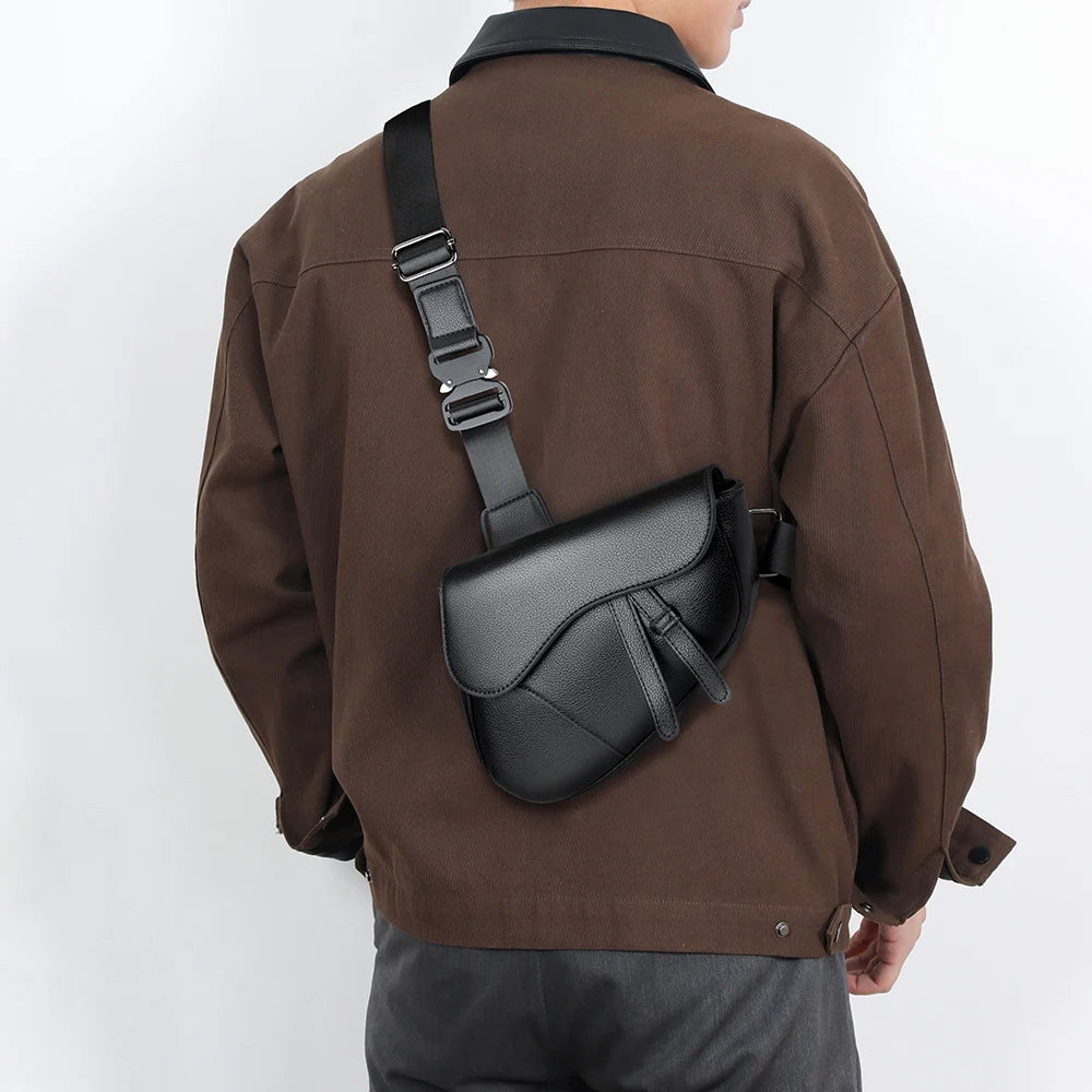 Person wearing a green shoulder bag on a plain background