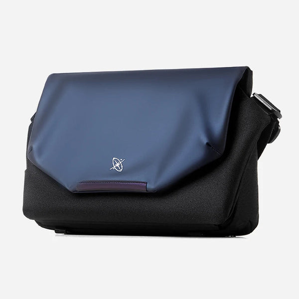 Blue and black bag with a visible brand logo on a white background
