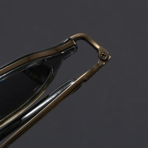 Close-up of a metallic object on a dark background