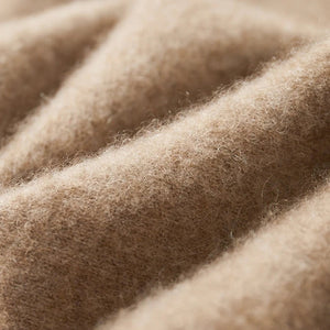 Close-up of beige fabric texture