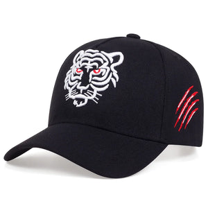 Black cap with white tiger emblem and red accents on a white background