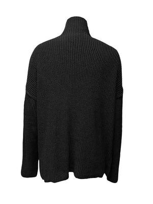 Black knit sweater on a white background