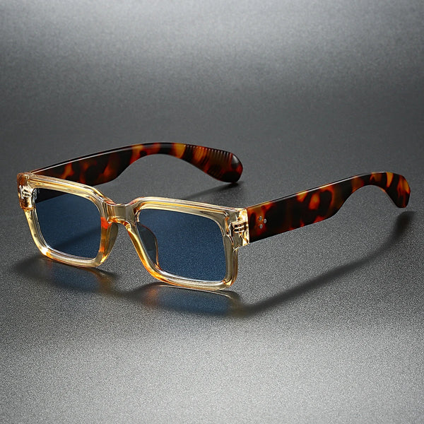 Sunglasses with tortoiseshell arms on a gray background