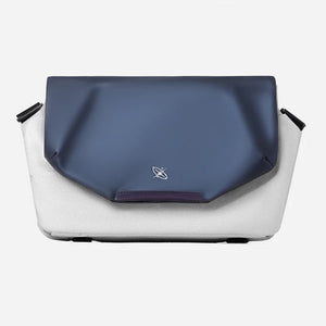 White and blue bag with a logo on a white background