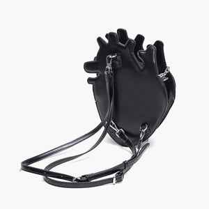 Black handbag with unique design on a white background