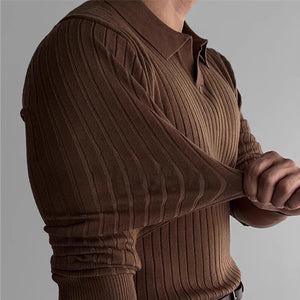 Brown ribbed sweater worn by a person on a gray background
