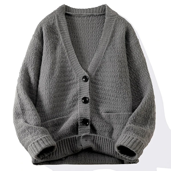 Gray cardigan with buttons on a white background