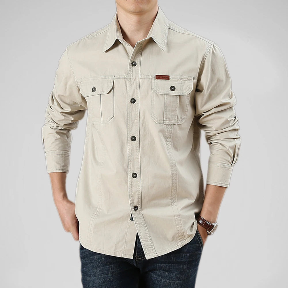 Green shirt worn by a person on a gray background