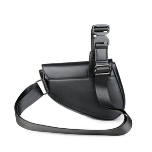 Black leather crossbody bag with a strap on a white background