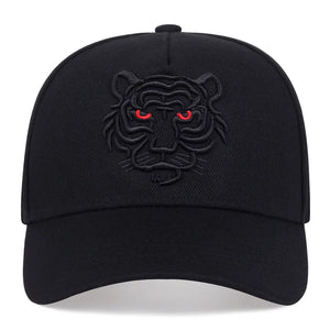 Black cap with a tiger emblem featuring red eyes on a white background