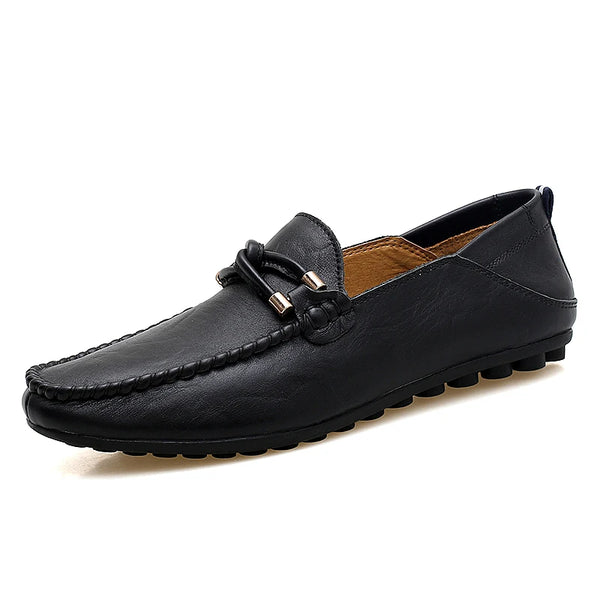 Black leather loafer shoe on a white background
