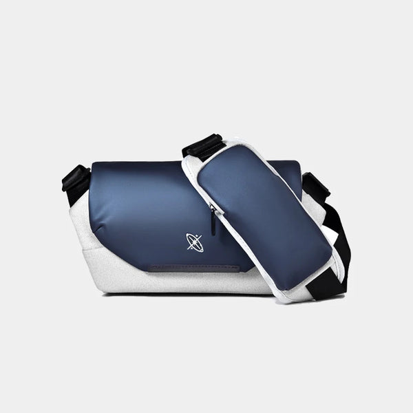 Blue and white bag with black accents on a light gray background