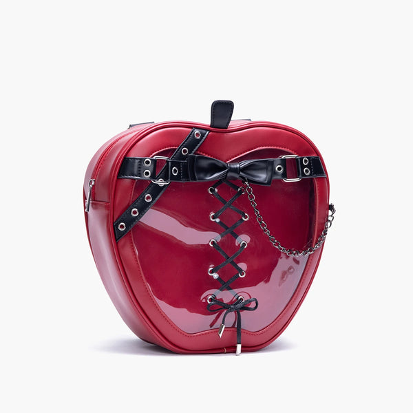 Red apple-shaped bag with black accents on a white background