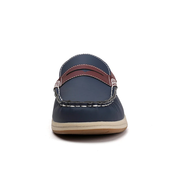 Navy blue slip-on shoe with brown accents on a white background