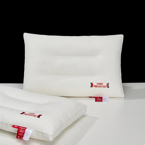 Two white pillows with 'Three Prevention' branding on a light gray surface.