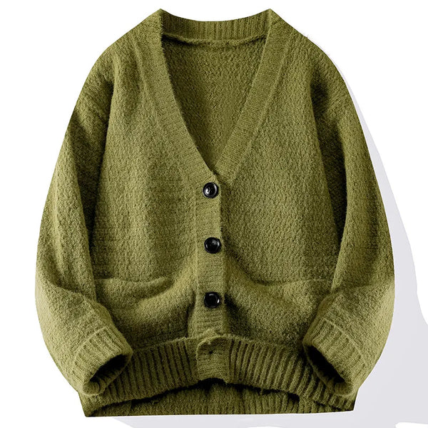 Green knitted cardigan with buttons on a white background