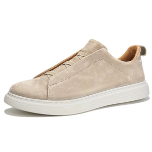 Beige sneaker with white sole on a white background