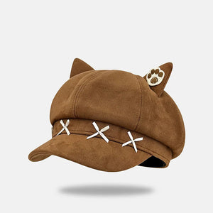 Brown cap with cat ears and paw print on a white background
