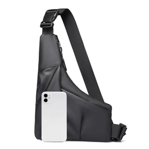 Black sling bag with a white phone on a white background