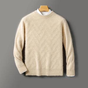 Beige sweater on a wooden hanger against a gray background
