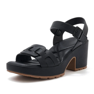 Black sandal with a block heel on a white background